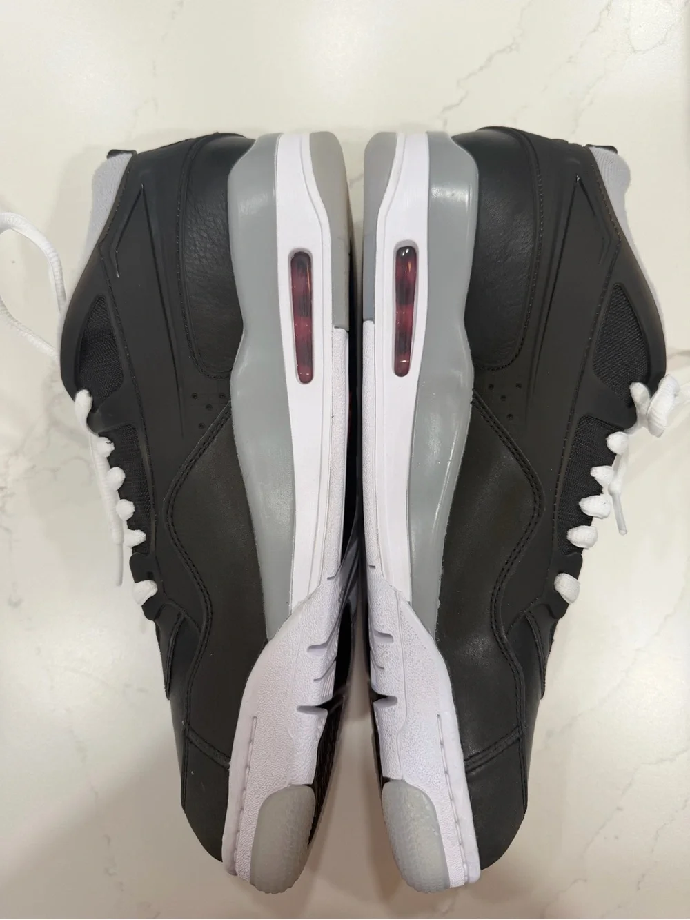 Air Jordan Nike 4RM PRM Men’s Black, Gray and White Low-Top Sneakers